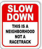 Double-sided Slow down this is a neighborhood not a racetrack metal outdoor sign